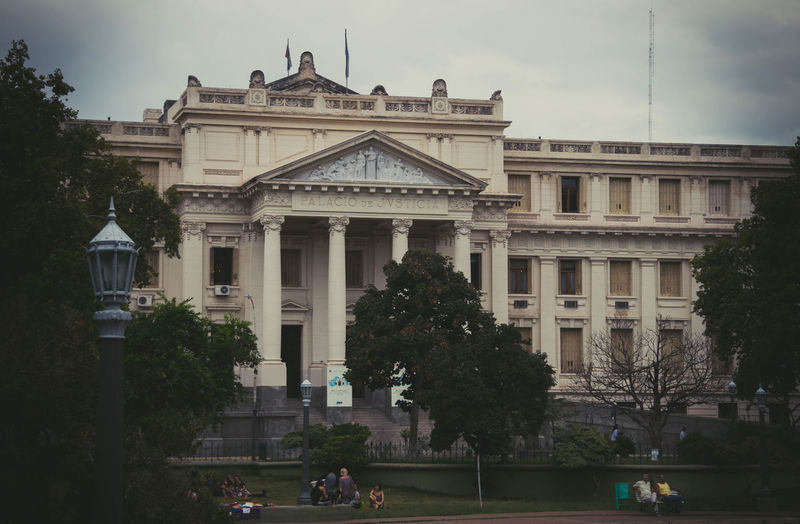 Facade of historic building against sky