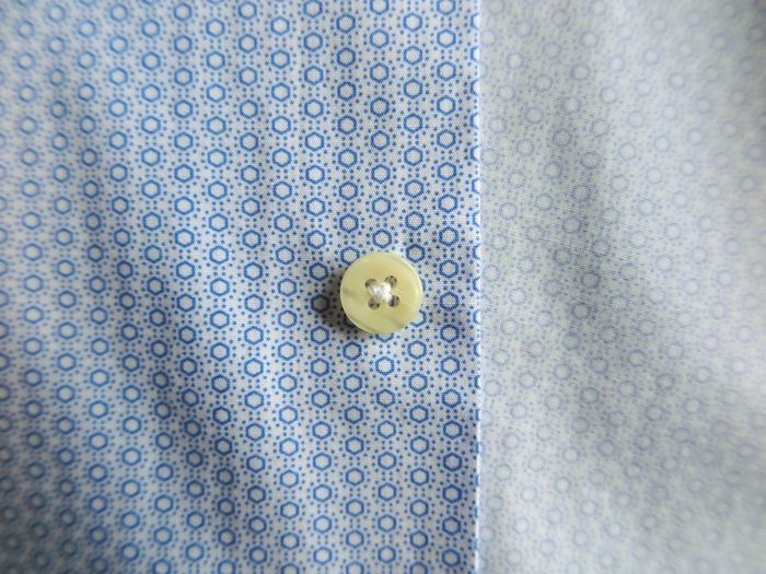 Close-up of button on shirt