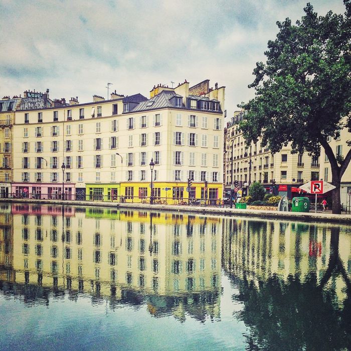 Canal saint-martin against buildings in city
