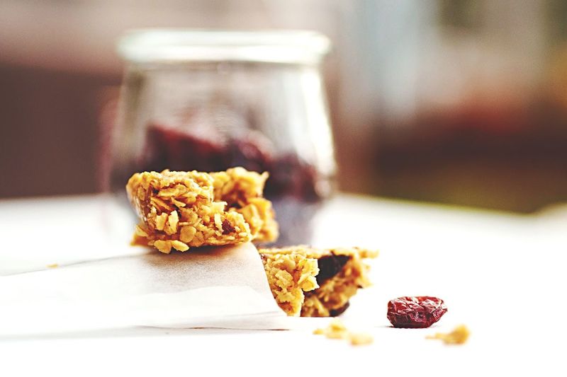 Muesli bar with cranberry on table
