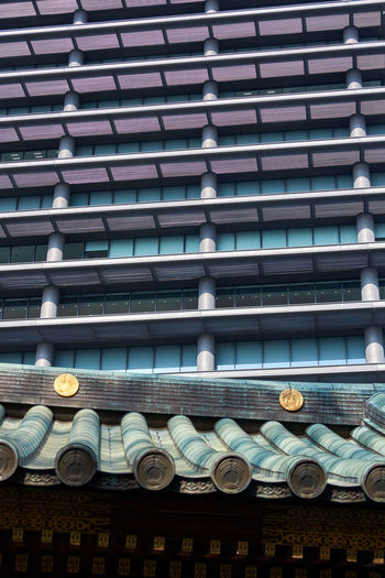 Low angle view of illuminated building in city