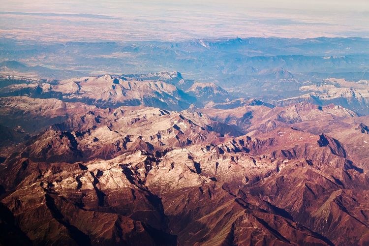 High angle shot of rocky landscape against sky