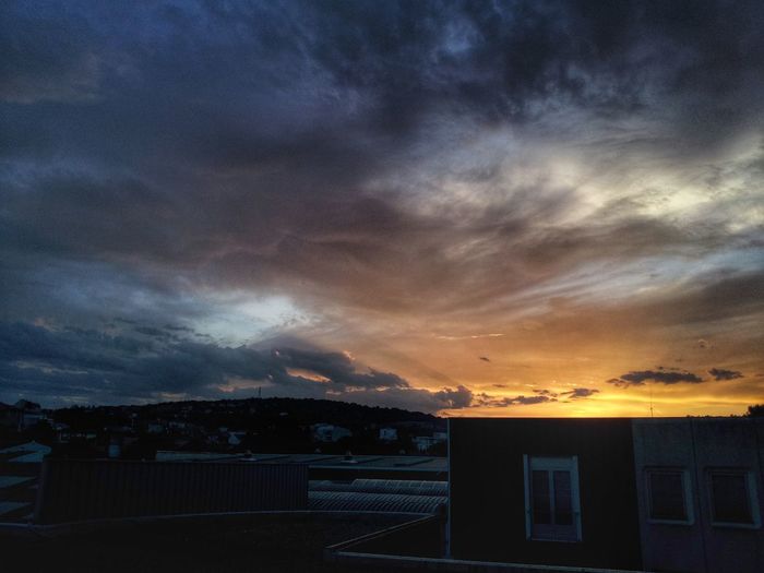 Scenic view of dramatic sky during sunset
