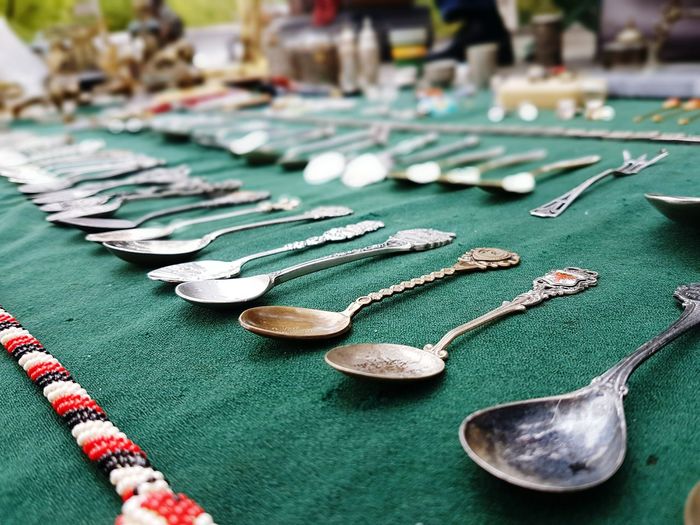 Close-up of spoons on flea market