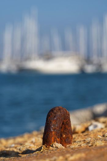 Close-up of rusty metal on port 