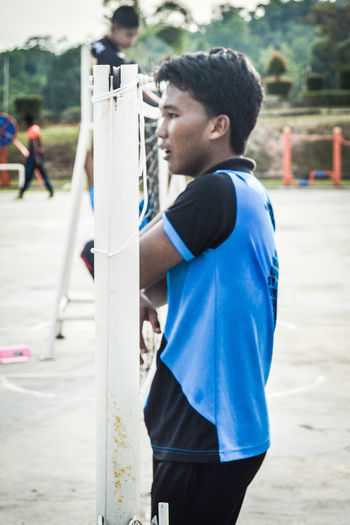 Side view of young man