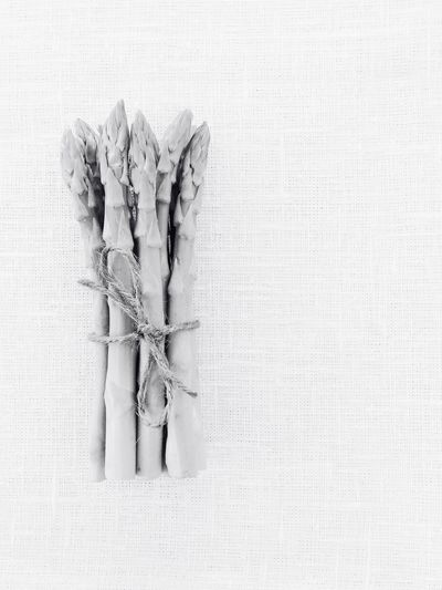 Bunch of asparagus on table