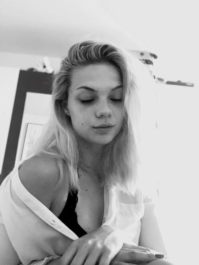 Tired young woman at home