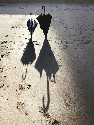 High angle view of shadow on beach