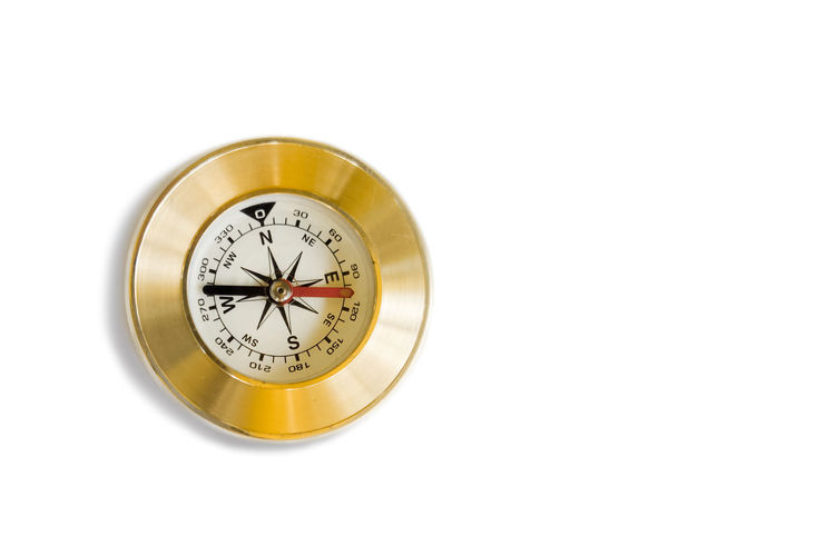 Close-up of clock against white background