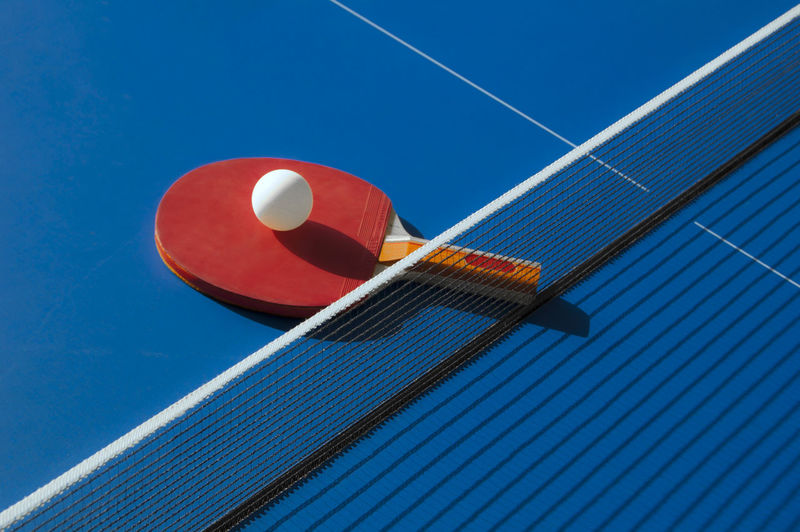 Close-up of table tennis ball and racket