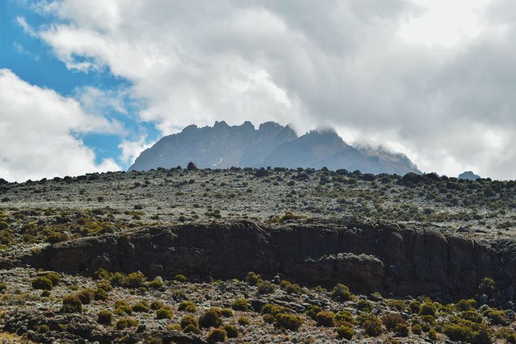 Mawenzi peak against a cloudy sky, mount kilimanjaro, tanzania