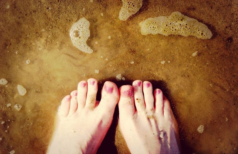 Human feet in water