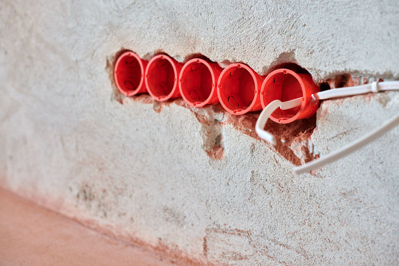 High angle view of red paint on wall