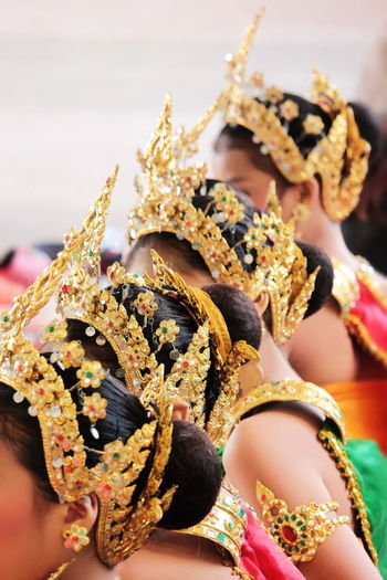 Close-up of women wearing headdress during festival