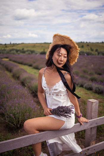 Pretty asian woman in lavender field