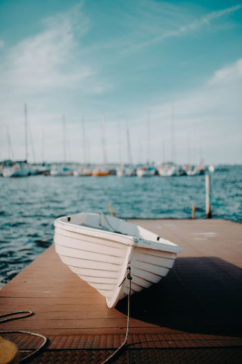 Boats moored at harbor