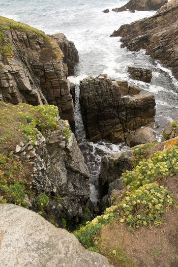 High angle view of rocky sea shore