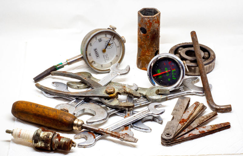 High angle view of metallic equipment on table