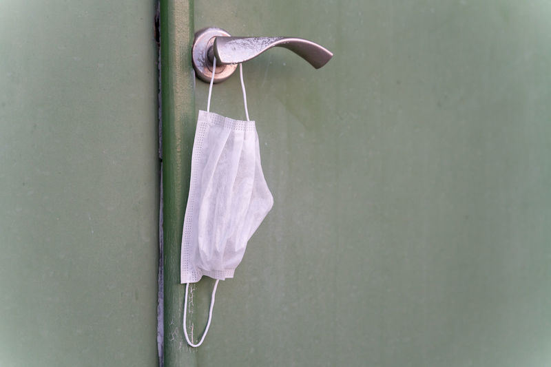 Close-up of clothes hanging on wall