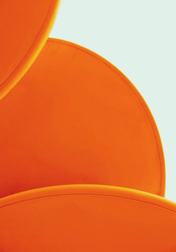 Orange objects against white background