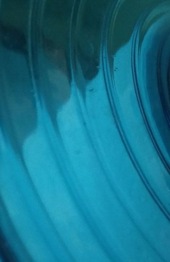 Full frame shot of blue glass