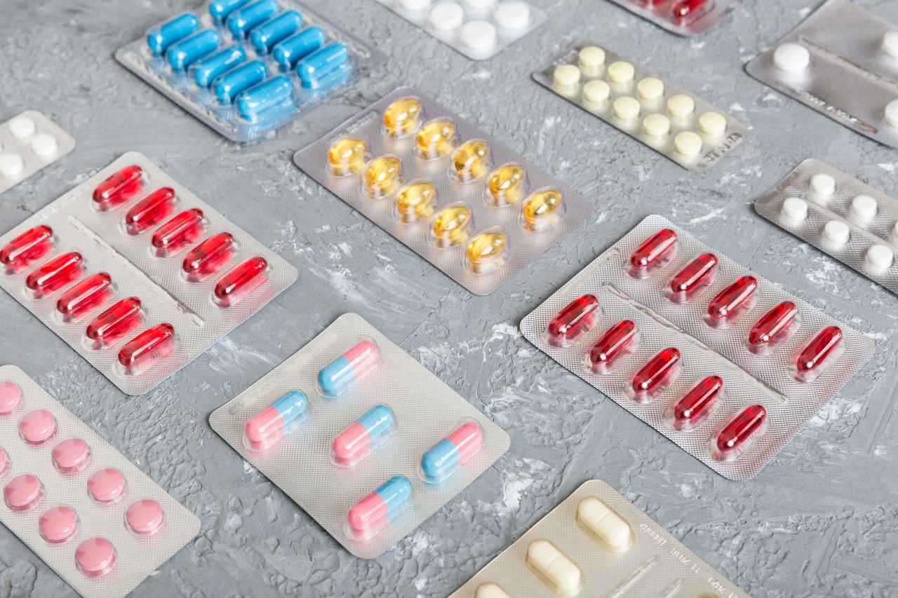 pill, no people, dose, blister pack, high angle view, medicine, healthcare and medicine, control, large group of objects, close-up, in a row