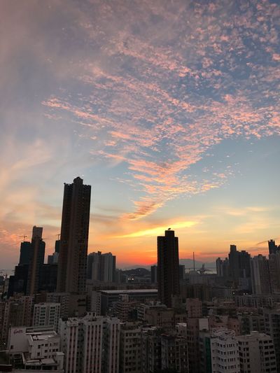 Cityscape against sky during sunset