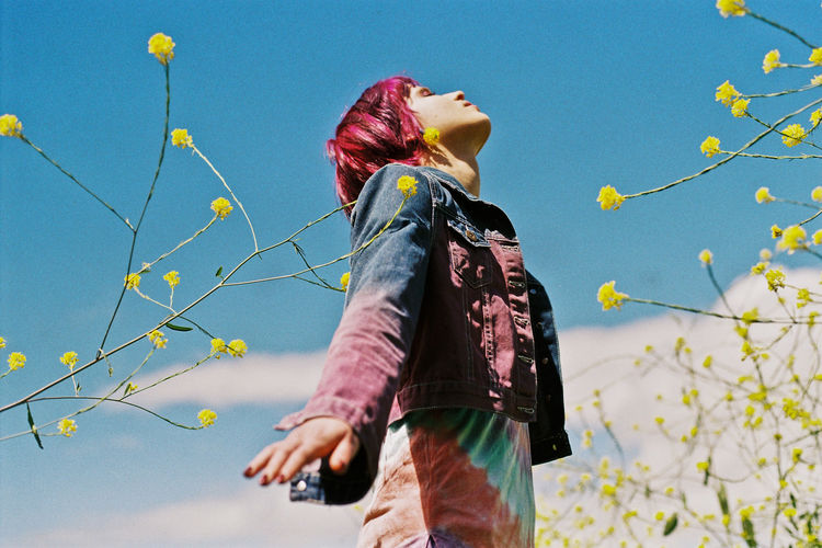 Spring Sprung 35mm Analogue Photography Blue Capetown Clear Sky Dyed Hair Film Filmisnotdead Leisure Activity Low Angle View Model Nature One Person Outdoor Outdoor Photography Outdoors Pink Pink Hair Real People Sky Spring The Street Photographer - 2017 EyeEm Awards Tiedye Young Women