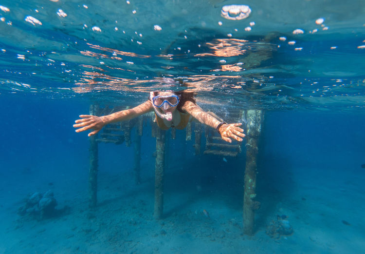 Woman snorkeling in sea