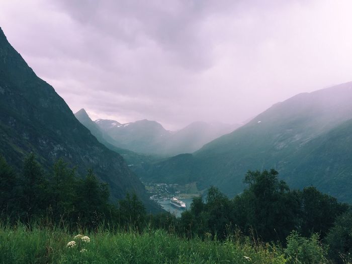 Geiranger fjord and village on a rainy day, in norway