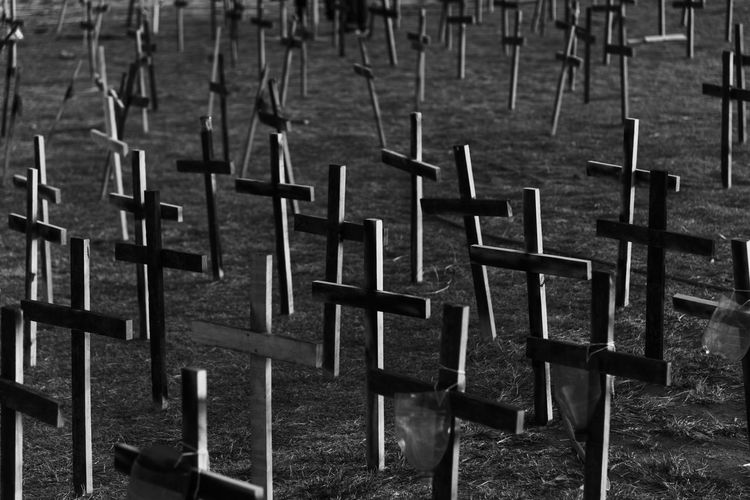 Crosses fixed to the ground in honor of those killed by covid-19. salvador, bahia, brazil.