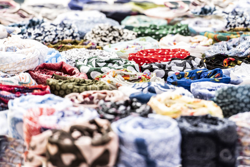 Close-up of multi colored textiles for sale in market