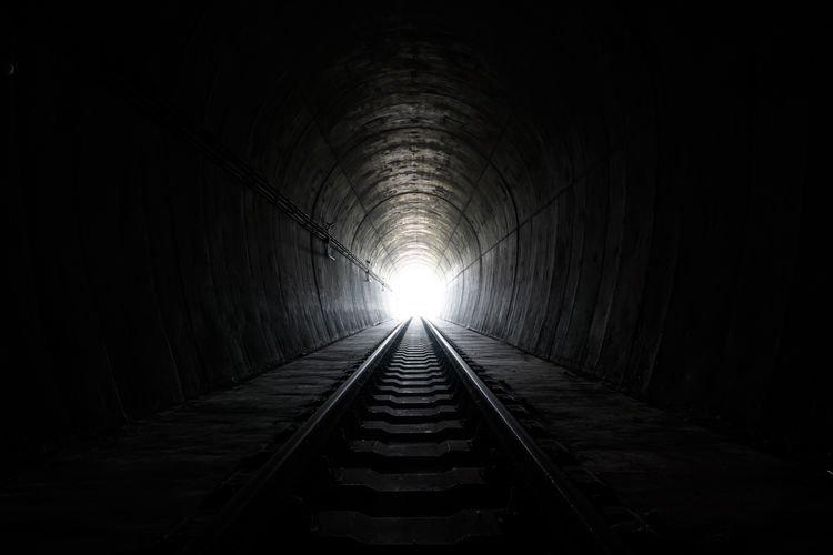 View of railroad tracks in tunnel