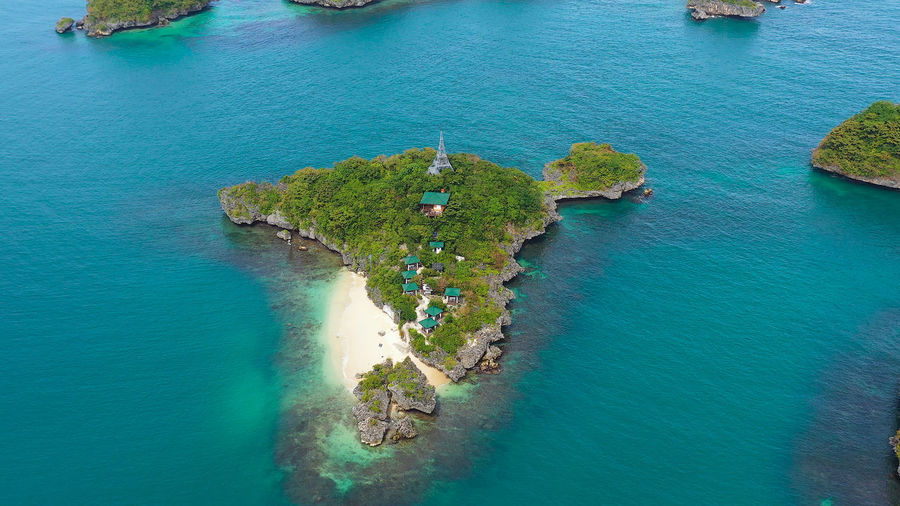 Aerial view of small islands with beaches and lagoons in hundred islands national park, pangasinan
