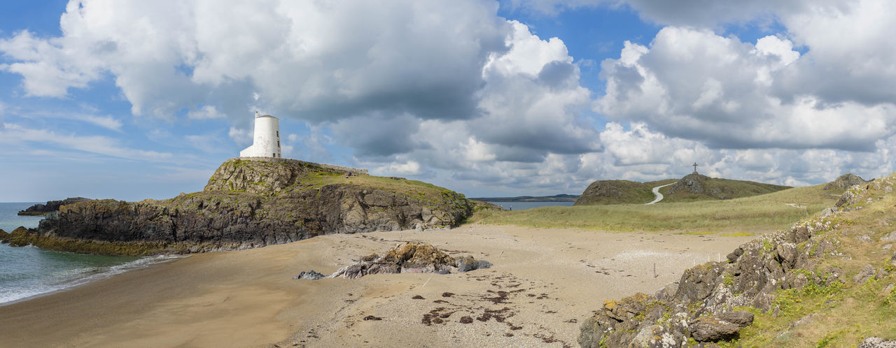A panoramic view of the lighthouse and monument on ynys llanddwyn on anglesey north wales