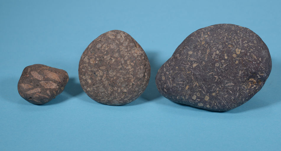 Close-up of stones against blue background