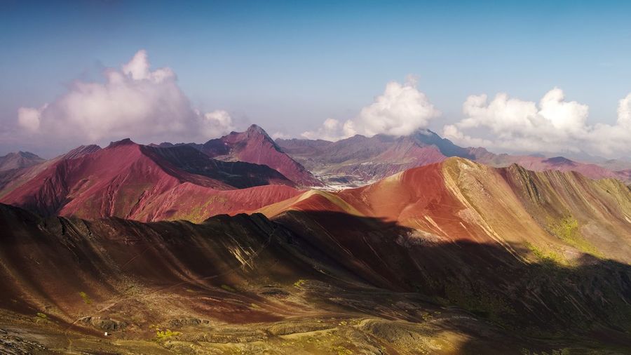 Scenic view of volcanic mountains against sky
