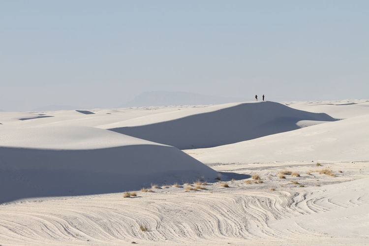Couple on a dune in white sands national park