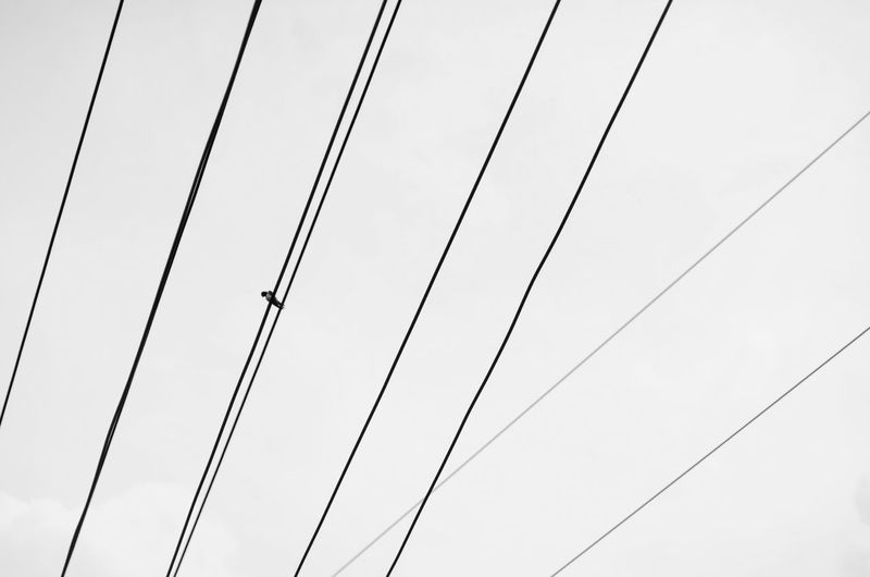 Low angle view of electricity pylon