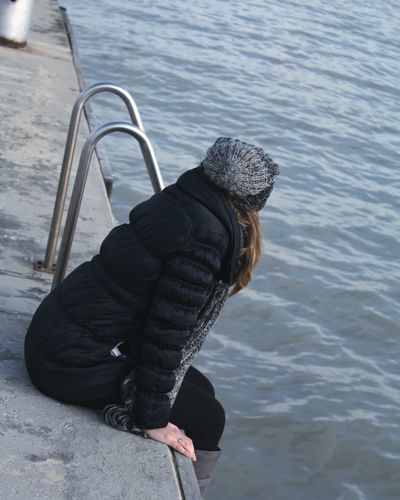 Woman looking at lake