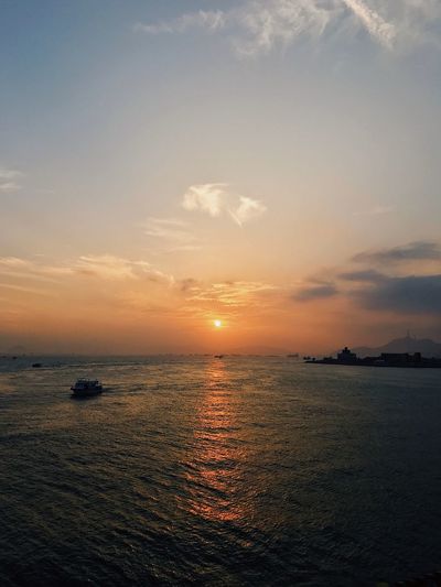 Scenic view of sea against sky during sunset