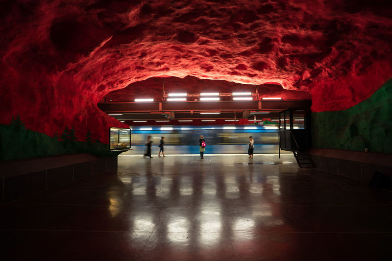 Illuminated subway tunnel at subway station