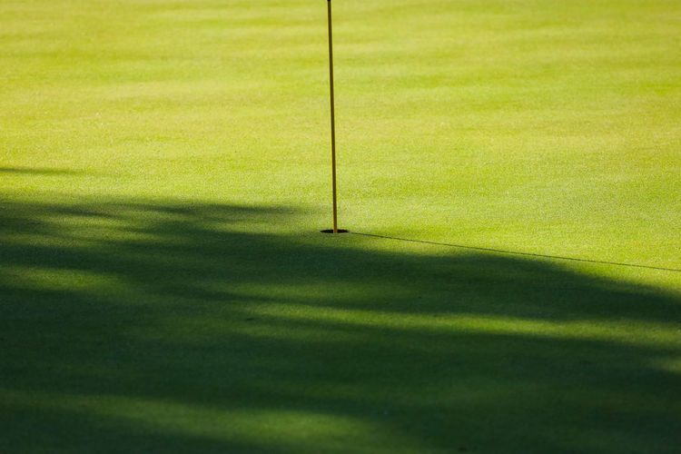 Sunlight falling on golf course