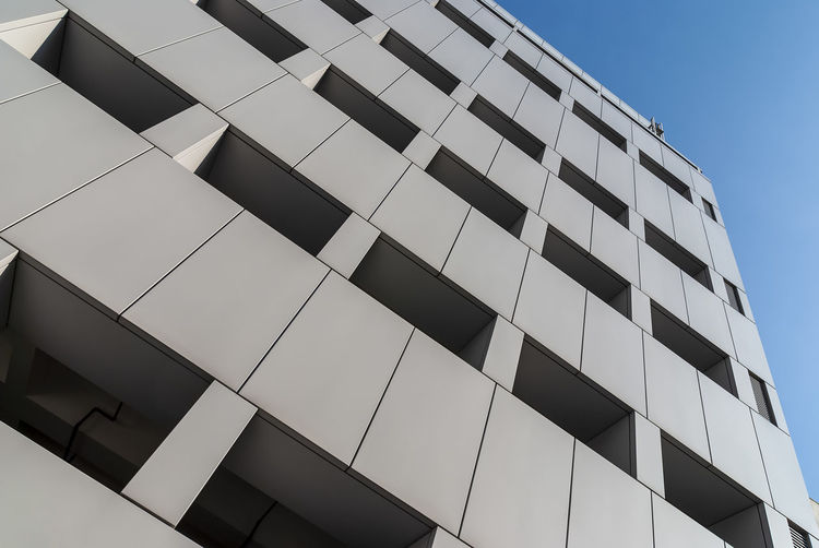 Low angle view of modern building against sky