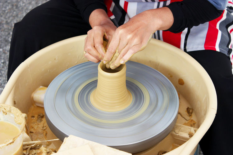 Midsection of craftsperson at work