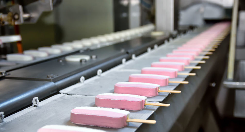 Ice pops on machinery in factory