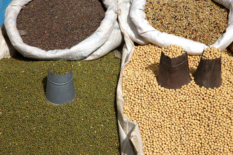High angle view of various peas for sale in market