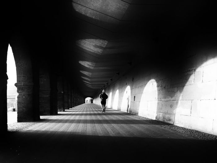People walking in tunnel