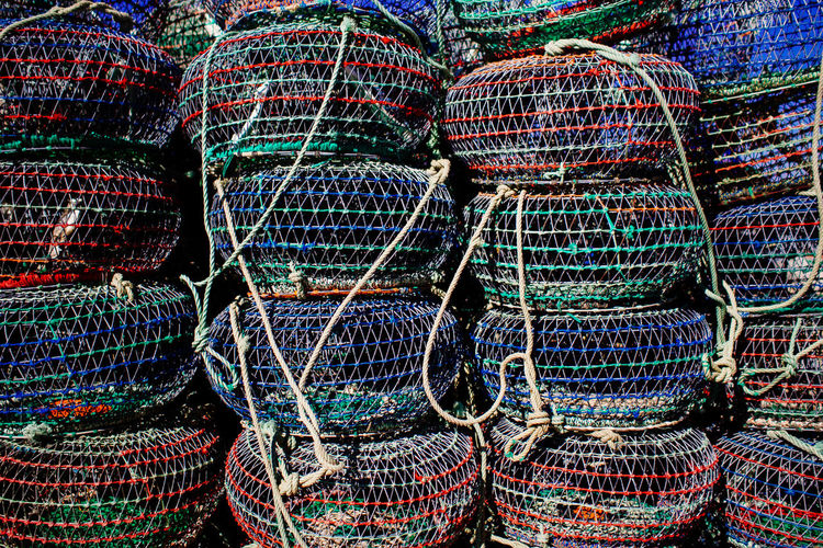 Full frame shot of fish traps stacked outdoors